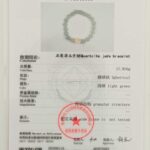 A certificate from NGTC for a Mint Green Aventurine Quartz Bracelet – Round Beads with Cat Paw Charm, featuring a bracelet photo, weight (17.91g), shape (spherical), color (light green), and official red stamps.