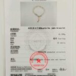 A testing certificate for the Icy Green Tianshan Cui Chalcedony Bracelet (Bamboo-Knot Beads with White Lucky Pouch Charm) from NGTC, showing weight, color, shape, texture, a photo of the bracelet, red stamps, and barcodes at the bottom.