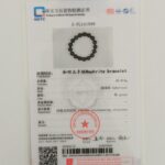 A gemstone testing certificate shows the Deep Green Nephrite Jade Bracelet – 12mm Polished Round Beads, with weight, shape, structure details, official logos, a QR code, and a red stamp alongside its photo.