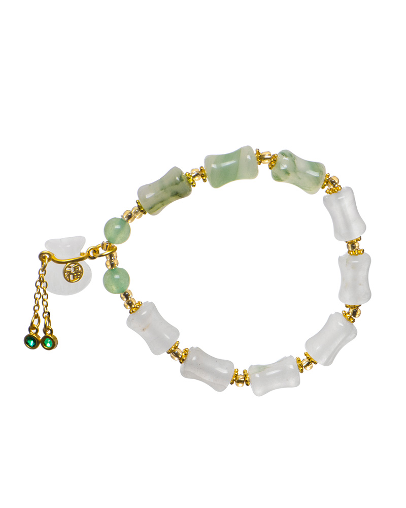 LYU_3783 The Icy Green Tianshan Cui Chalcedony Bracelet features irregular white and green bamboo-knot beads, gold spacers, a gold adjustable chain, and a white lucky pouch charm at the clasp.