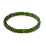 Studio photo of a fresh green Nephrite (soft jade) bracelet, featuring slim rondelle beads with subtle speckling and a smooth polish, on a white background.