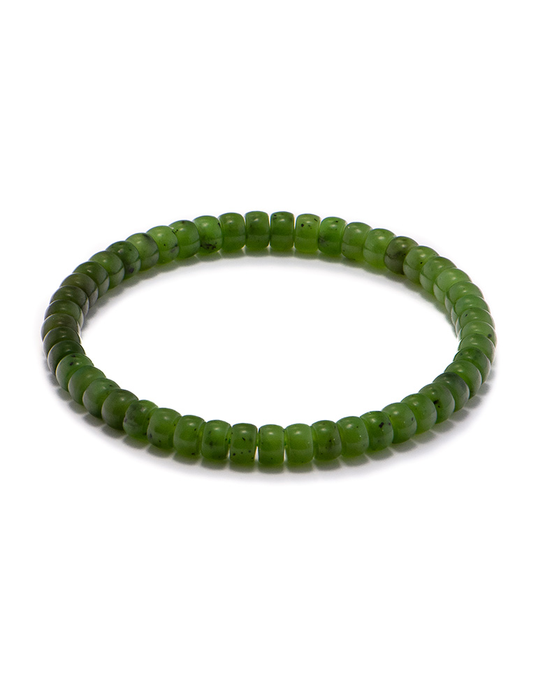 LYU_3808 Studio photo of a fresh green Nephrite (soft jade) bracelet, featuring slim rondelle beads with subtle speckling and a smooth polish, on a white background.