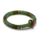 Studio photo of a green Nephrite (soft jade) bracelet, featuring carved ring-shaped beads with deeper olive sections and a brownish-red accent ring, on a white background.