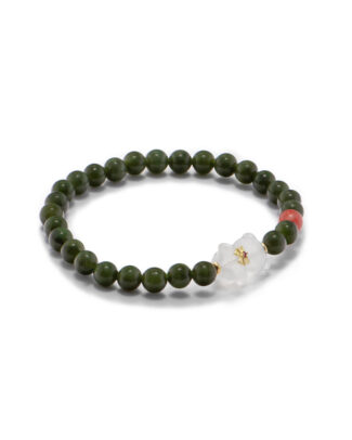Deep green nephrite jade beaded bracelet with a clear quartzite bear centerpiece and gold-tone accents on a white background.