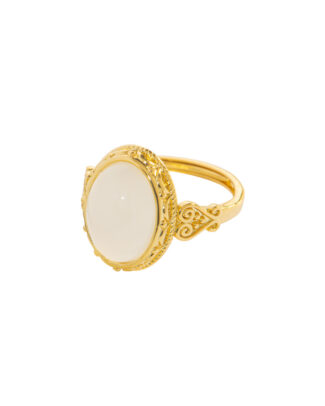 Studio photo of a white Nephrite (soft jade) ring, featuring an oval cabochon in an ornate high-polish gold-tone setting, on a white background