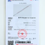 The NGTC-issued "Jadeite bracelet" certificate for the Greenish White Jadeite Halo Tennis Bracelet features an image, details of weight, shape, color, and a red verification stamp.