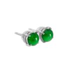 Round green jadeite cabochon stud earrings in high-polish sterling silver prong settings on a white background.