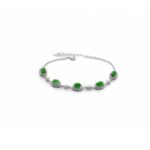 Vivid green jadeite halo link bracelet in high-polish sterling silver