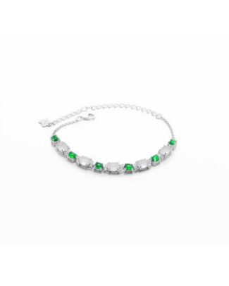 Green & greenish white jadeite halo station bracelet with oval cabochons and bezel-set brilliance in high-polish sterling silver.