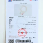 A gemstone testing certificate with Chinese and English text, showing details for a spherical Quartzite Jade adornment, weighing 22.633g, with descriptions, a photo of the item, official seals, and a barcode at the bottom.