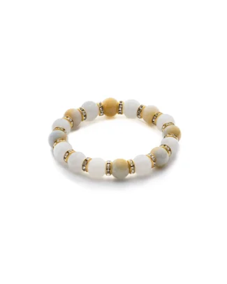 A beaded bracelet featuring alternating white and yellow round stones with small gold and rhinestone spacer beads between each stone, arranged in a circular pattern.