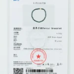 Testing certificate for a Feicui bracelet, showing an image of a dark green interwoven bracelet, technical specifications, and a red approval stamp, issued by the NGTC Testing Center for Gems & Jewelry.