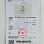 A jewelry testing certificate for a Feicui neck adornment with a photo of a round pendant featuring a green center stone and gold detailing. The certificate includes details, measurements, and official stamps.