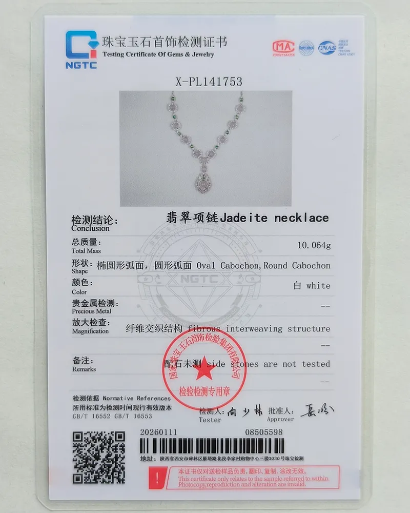 IMG_20260115_153641 A jewelry certificate showing a photo of a jadeite necklace with round and oval cabochon stones, details in Chinese and English, weight of 10.064g, and several official stamps and signatures.