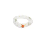white, light green quartzite jade bracelet showing carved bead adornment with link-like white forms and a red focal accent