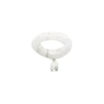 white, light green quartzite jade bracelet showing beaded bracelet with a ring-shaped focal detail and twin drop ending