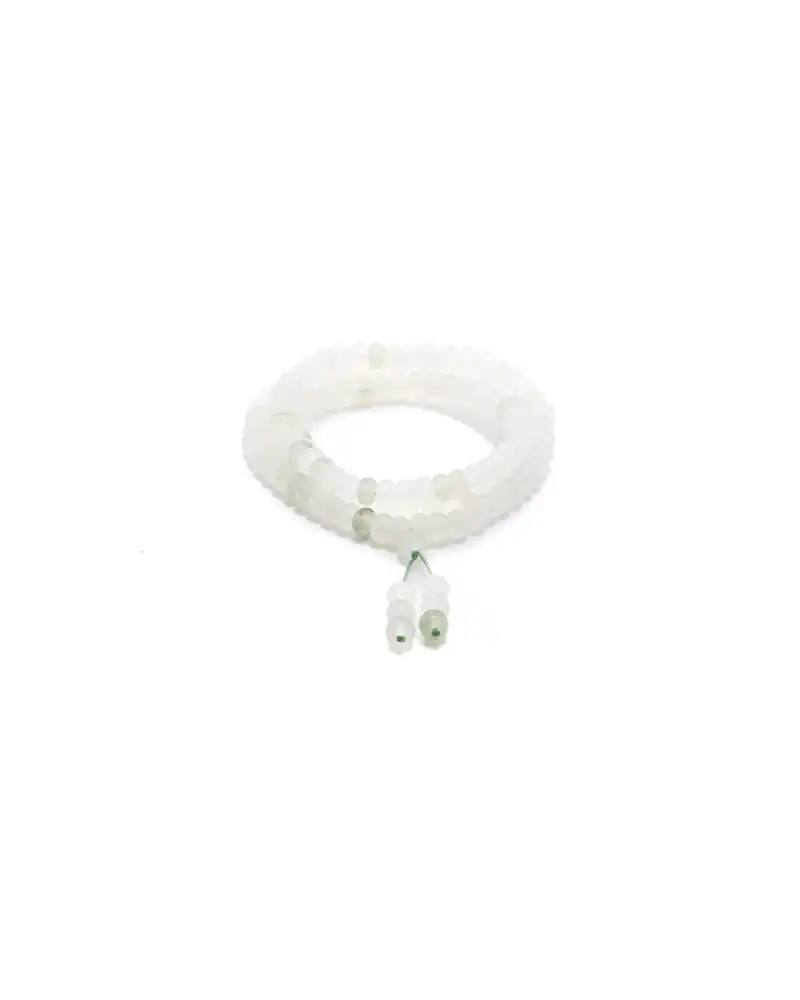 LYU_4888 white, light green quartzite jade bracelet showing beaded bracelet with a ring-shaped focal detail and twin drop ending