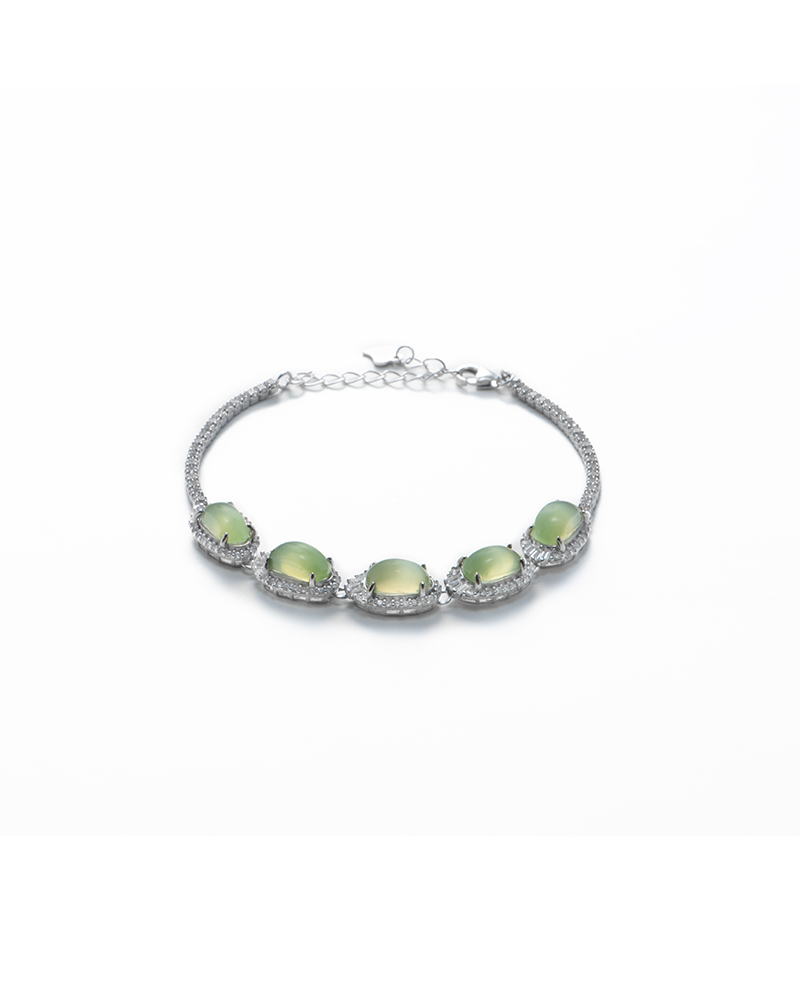 Grayish white Nephrite Jade bracelet with oval cabochon detail on white background