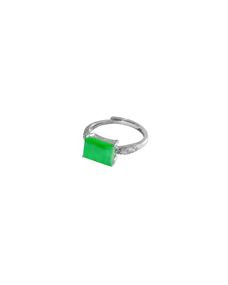Light green Jadeite ring with rectangular faceted detail on white background