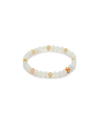 A beaded bracelet made of white and light yellow round stones, featuring one gold-colored bead with a small red accent, displayed on a white background.
