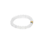 A simple bracelet made of round, translucent white beads with a single decorative gold and blue bead accent. The bracelet is arranged in a circle on a white background.