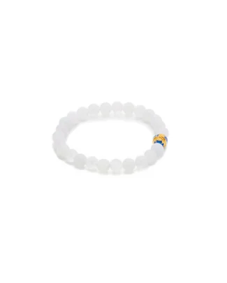 A simple bracelet made of round, translucent white beads with a single decorative gold and blue bead accent. The bracelet is arranged in a circle on a white background.