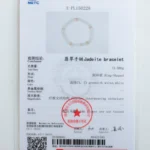 A gem testing certificate showing details and a photo of a jadeite bracelet. The document includes a red official stamp, measurements, gemstone info, and a diagram of the bracelets arrangement.