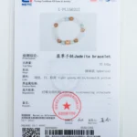 A jewelry testing certificate for a jadeite bracelet with a photo of the bracelet at the top. The certificate lists details such as weight, shape, color, structure, and includes official stamps and signatures.