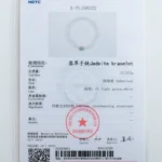 A gemstone identification certificate for a jadeite bracelet, featuring a photo of the bracelet, testing results, a red official stamp, barcodes, and text in both Chinese and English.