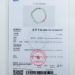 A jewelry testing certificate displays details for a jadeite bracelet, including weight, characteristics, and a photo of the bracelet with multicolored beads. The document has Chinese and English text, a red stamp, and official seals.
