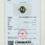 A jewelry testing certificate featuring an oval green jade (nephrite) ring, with details in Chinese and English about weight, color, and shape, and an official red stamp in the center.