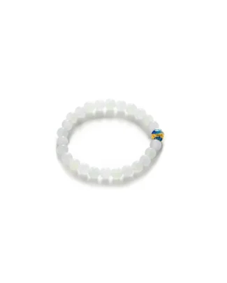 The White and Light Green Jadeite Bead Bracelet features spherical white and light green beads with a striking blue accent, ideal for those who appreciate elegant jadeite jewelry.