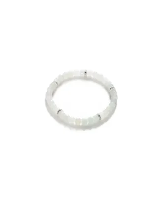A beaded bracelet made of translucent white stones, accented with small silver spacer beads, displayed on a plain white background.
