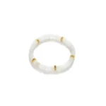 A beaded bracelet featuring translucent white beads and several evenly spaced gold accents, displayed on a plain white background.