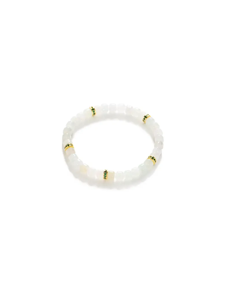 A white beaded bracelet with translucent round beads, accented by four gold rings spaced evenly around the band, displayed on a plain white background.