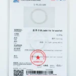Certificate for a jadeite bracelet from NGTC, showing details like bracelet weight (13.078g), color (light green, white), texture (fine), and a red official stamp in the lower section.