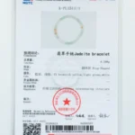 A gemstone testing certificate for a jadeite bracelet, labeled with details like weight (8.598g), color, shape (ring-shaped), and a small image of the bracelet. The document features red stamps and official logos.